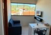 Onde se hospedar para conhecer a Serra das Confusões (Caracol/PI) Sala e área de trabalho de apartamento do Flat da Serra em Caracol